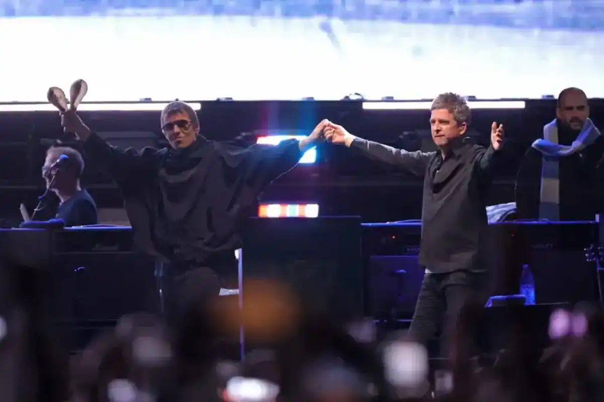 Liam Gallagher and Noel Gallagher walk out together during their Oasis Live ’25 world tour at MetLife Stadium on August 31, 2025 in East Rutherford, New Jersey.