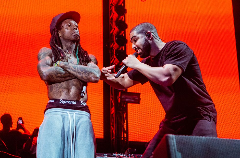 Lil Wayne and Drake perform at Lil Weezyana Festival at Champions Square on Aug. 28, 2015 in New Orleans, Louisiana.