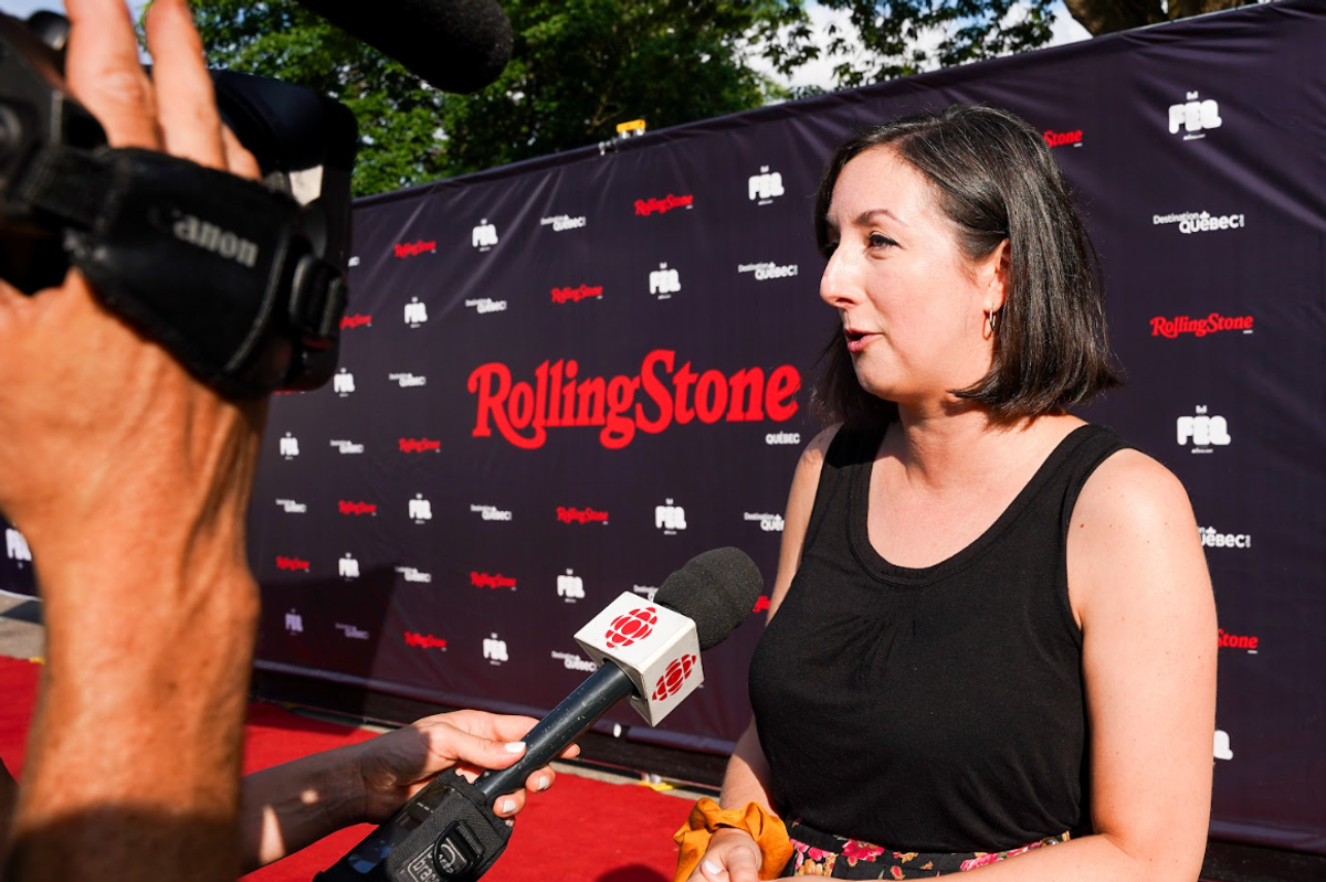 Marie-Lise Rousseau being interviewed by CBC at the Rolling Stone Quebec launch at FEQ 2024 in Quebec City.