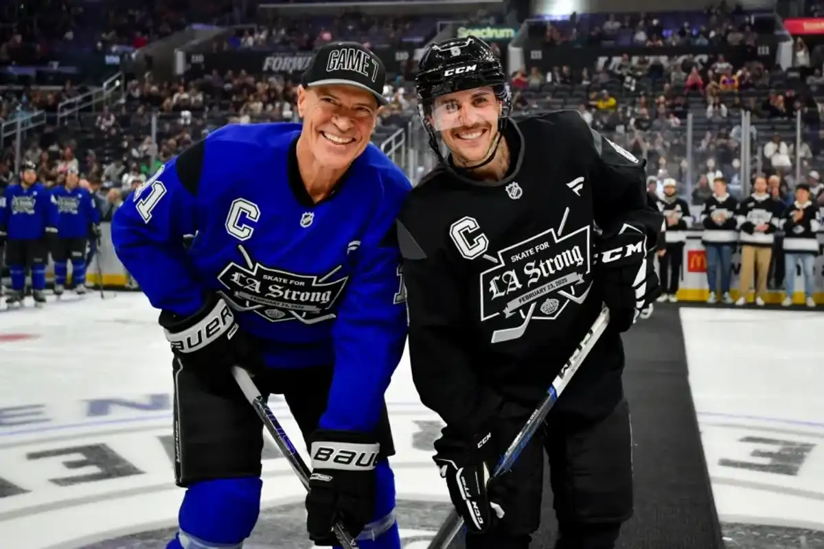 Mark Messier, No. 11 of Team Blue, and Justin Bieber, No. 6 of Team Black, pose during the ceremonial puck drop prior to the Skate for LA Strong event at Crypto.com Arena on Feb. 23, 2025 in Los Angeles, California.