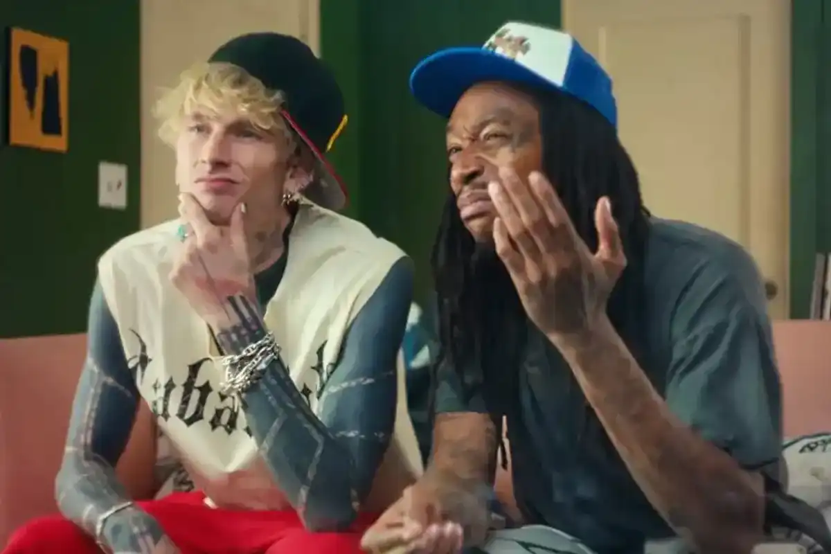 mgk and Wiz Khalifa in the "Girl Next Door" video.