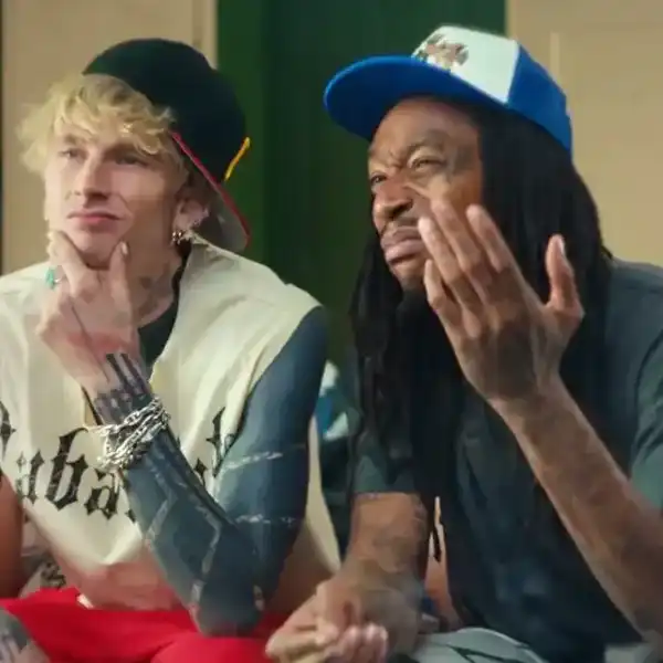mgk and Wiz Khalifa in the "Girl Next Door" video.