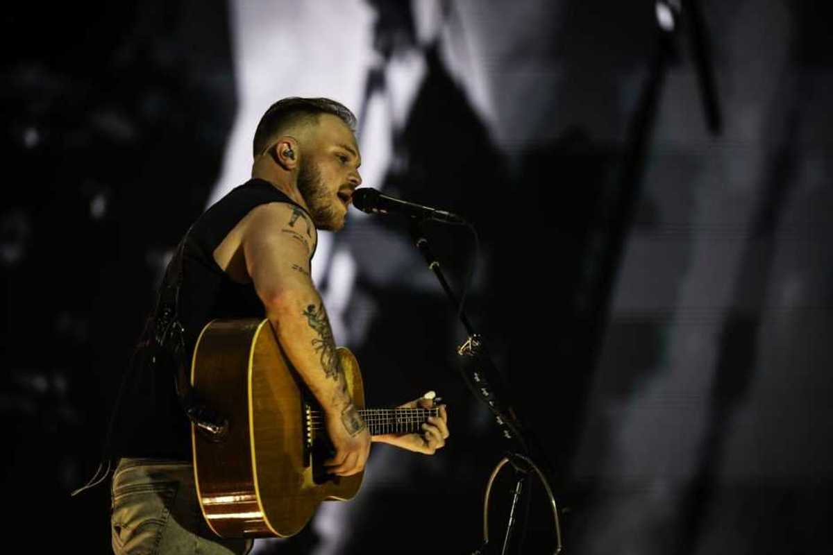 NASHVILLE, TENNESSEE - JUNE 29: Zach Bryan performs during the Quittin Time tour at Nissan Stadium on June 29, 2024 in Nashville, Tennessee. (Photo by Keith Griner/Getty Images)