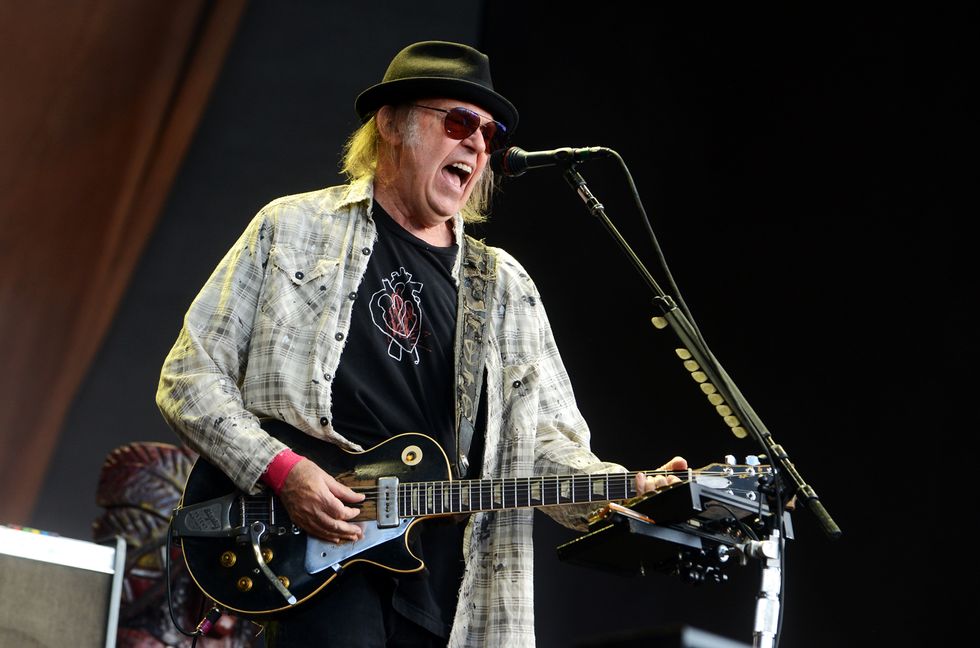 Neil Young performs on stage in Hyde Park on July 12, 2019 in London.