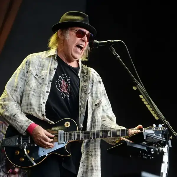 Neil Young performs on stage in Hyde Park on July 12, 2019 in London.