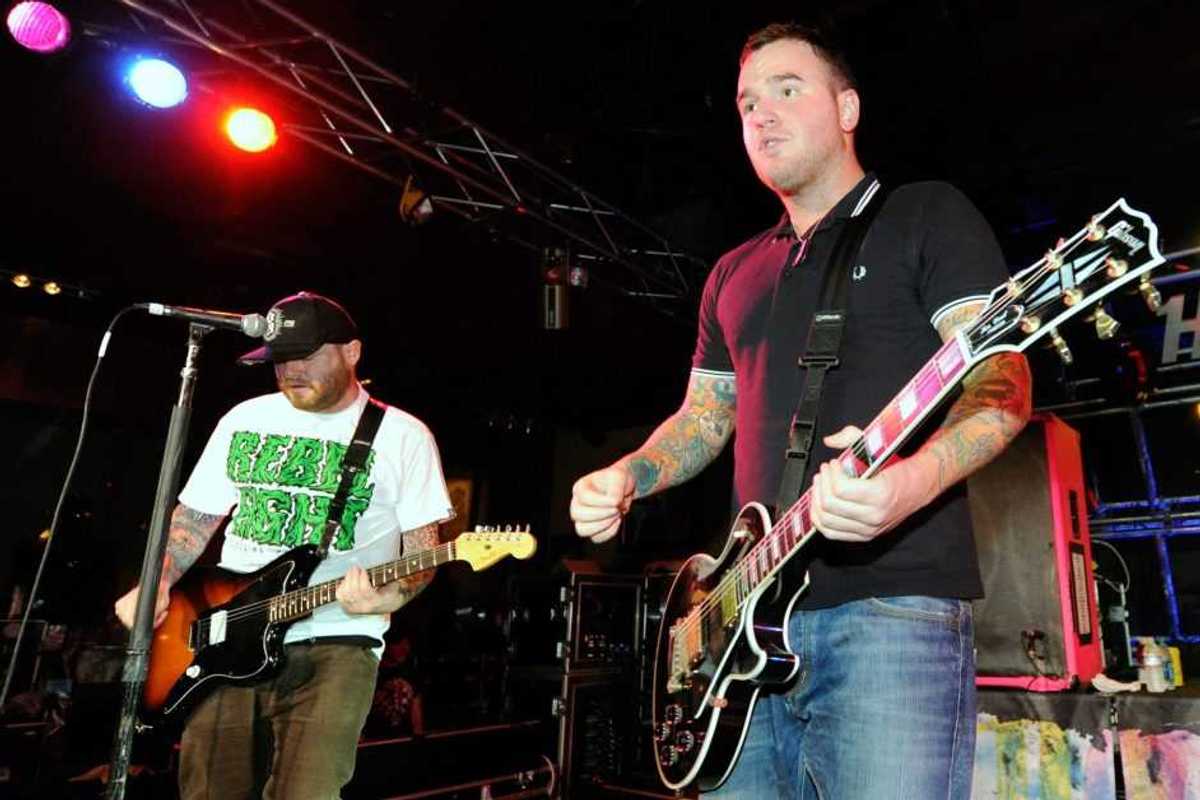 New Found Glory guitarists Steve Klein (L) and Chad Gilbert perform during the Pop Punk's Not Dead tour at the Hard Rock Cafe on the Strip in support of the band's new album, "Radiosurgery" on November 19, 2011 in Las Vegas, Nevada.