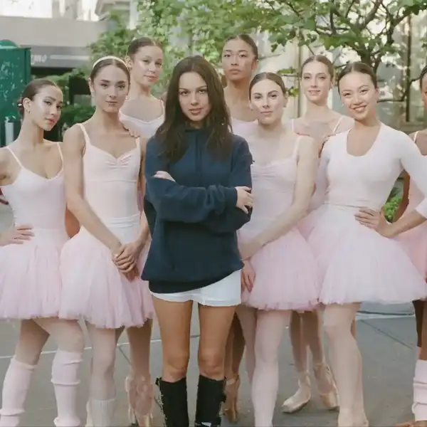 Olivia Rodrigo with the dancers, including Tiler Peck (immediate right) in her "stupid song" video.