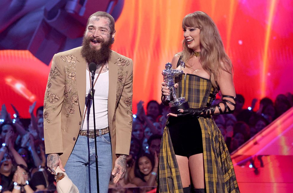 Post Malone and Taylor Swift accept the Best Collaboration award for "Fortnight" on stage during the 2024 MTV Video Music Awards at UBS Arena on Sept. 11, 2024 in Elmont, New York.