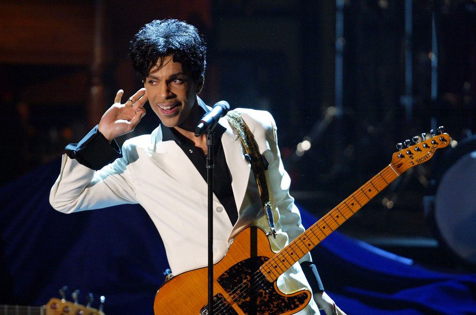 Prince performs after being inducted into the Rock and Roll Hall of Fame on March 15, 2004 in New York.