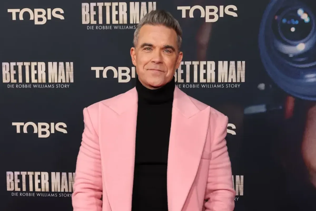 Robbie Williams attends the premiere of "Better Man - Die Robbie Williams Story" at Cinedom on December 08, 2024 in Cologne, Germany.