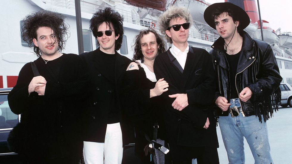 Robert Smith, Roger O'Donnell, Porl Thompson, Boris Williams and Simon Gallop of The Cure arrive in America on the QE2 at Pier 90 in New York City on Aug. 20, 1989. 