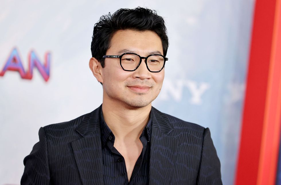 Simu Liu attends the World Premiere of "Barbie" at the Shrine Auditorium and Expo Hall on July 9, 2023 in Los Angeles.