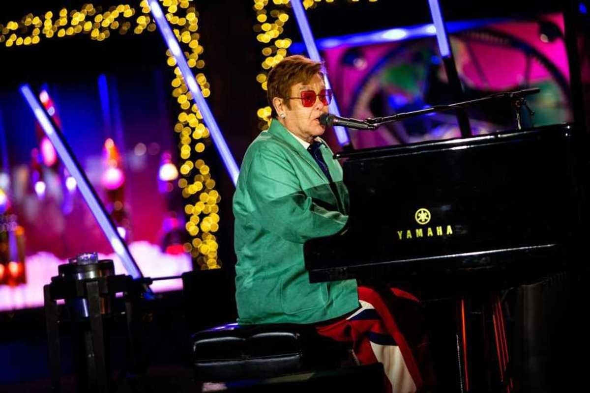 Sir Elton John performs in the opening ceremony for Saks Fifth Avenue’s Holiday Windows and Light show on November 22, 2022 in New York City.