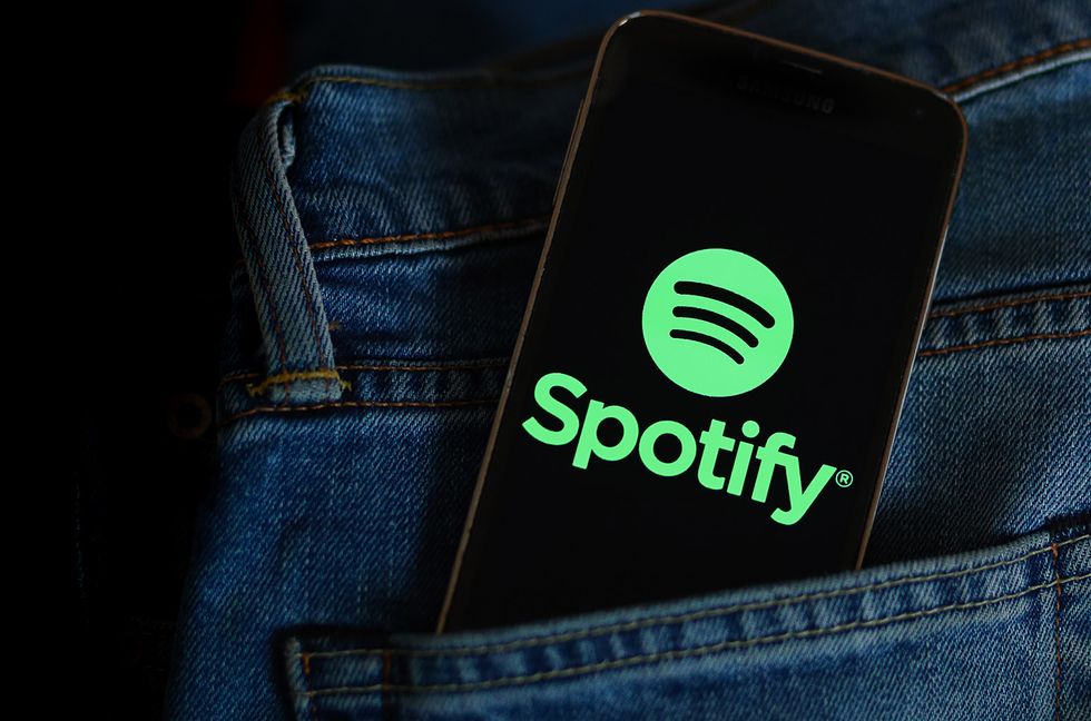 Spotify music app logo seen displayed on a smartphone.