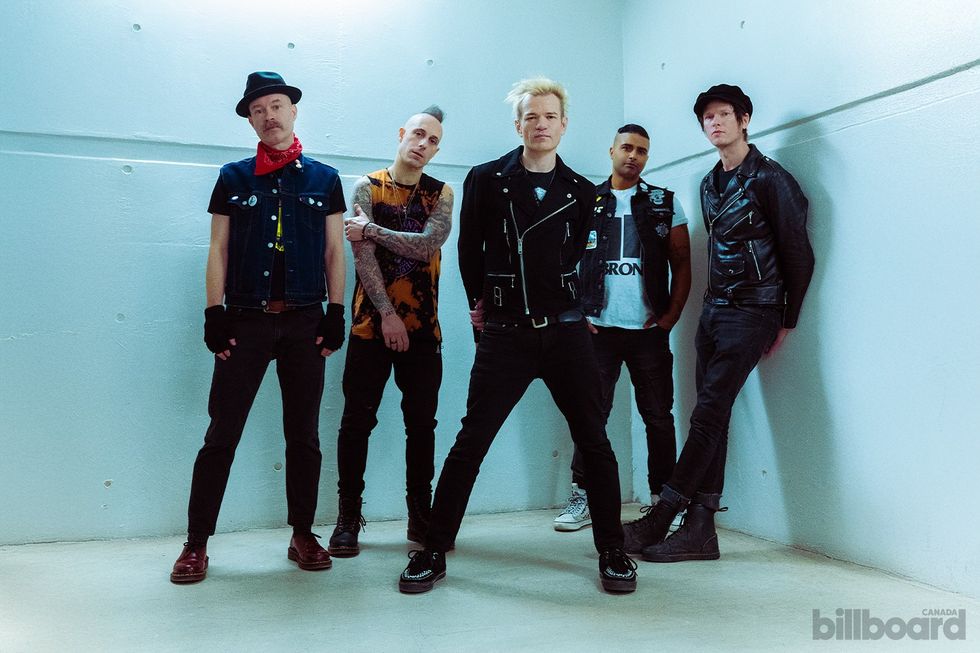 Sum 41 photographed by Lane Dorsey on Jan. 27, 2025 at Canada Life Place in London, Ontario. Left to right: Tom Thacker, Frank Zummo, Deryck Whibley, Dave "Brownsound" Baksh, Jason "Cone" McCaslin