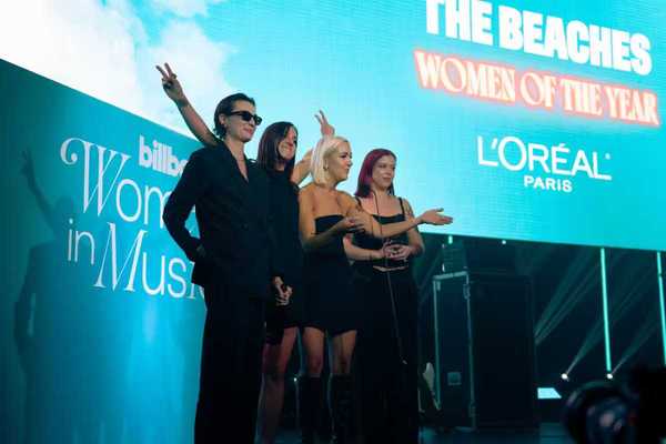 The Beaches accept the Women of the Year award at Billboard Canada Women in Music on Oct. 1, 2025 at Rebel in Toronto.