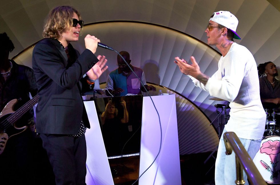 The Kid LAROI and Justin Bieber attends h.wood Group's grand opening of Delilah at Wynn Las Vegas on July 10, 2021, in Las Vegas.
