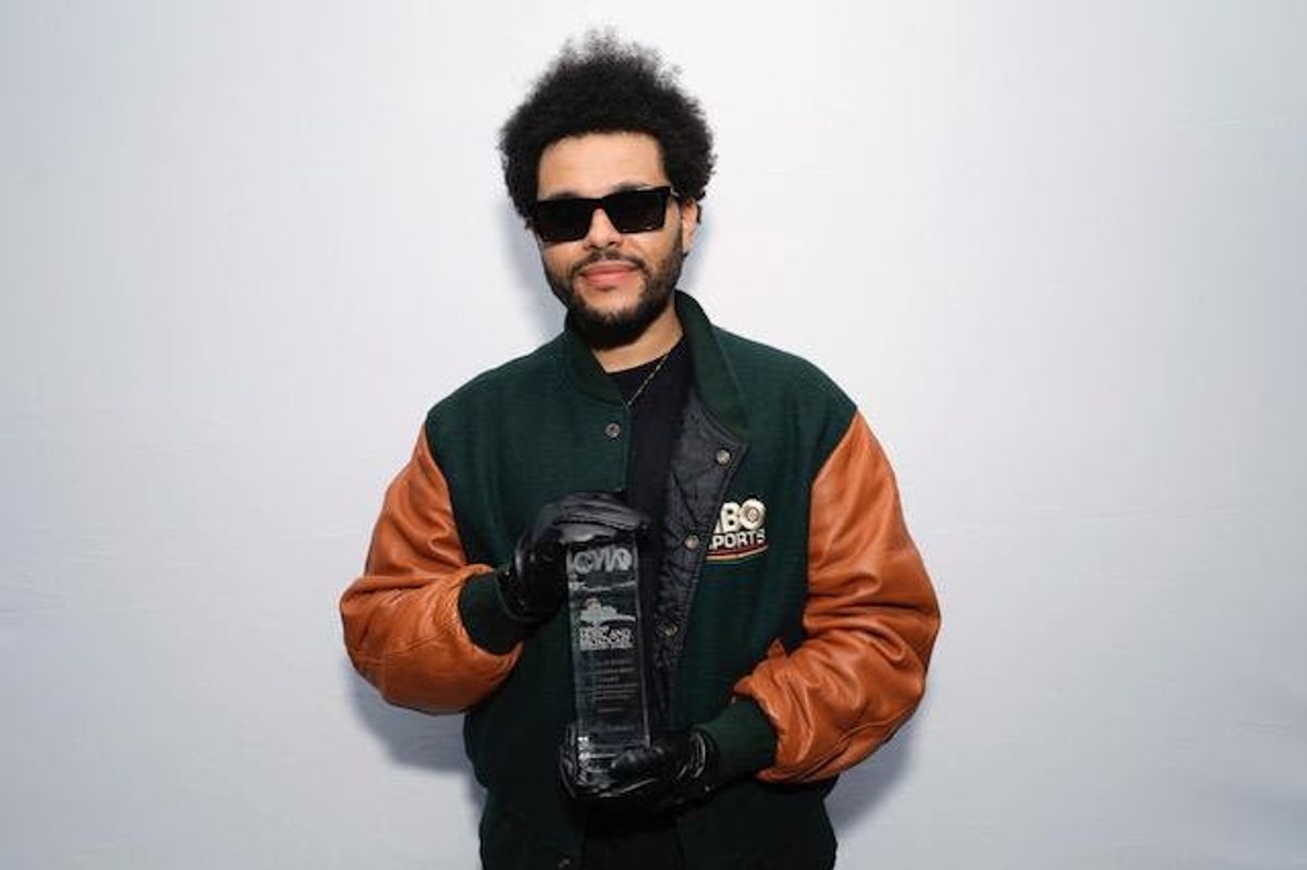 ​The Weeknd accepting the 2022 CMW Allan Slaight Humanitarian Spirit Award.
