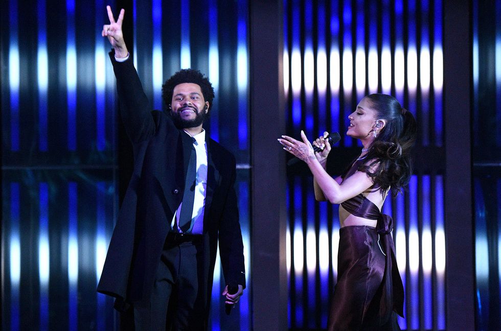 The Weeknd and Ariana Grande perform onstage at the 2021 iHeartRadio Music Awards at The Dolby Theatre in Los Angeles.