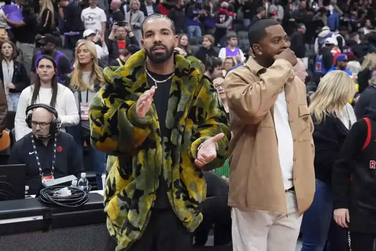 Toronto, ON - NOVEMBER 2: Drake claps at the end of the game between the Sacramento Kings and the Toronto Raptors.