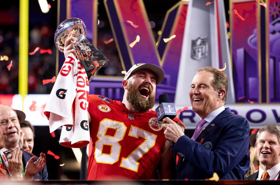 Travis Kelce #87 of the Kansas City Chiefs celebrates with the Vince Lombardi Trophy following the NFL Super Bowl 58 football game between the San Francisco 49ers and the Kansas City Chiefs at Allegiant Stadium on Feb. 11, 2024 in Las Vegas.