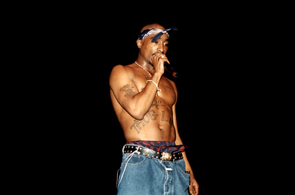 Tupac Shakur performs at the Regal Theater in Chicago, Illinois in March 1994.
