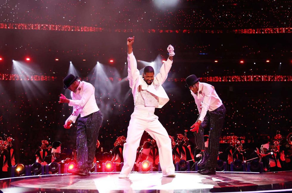 Usher performs onstage during the Apple Music Super Bowl LVIII Halftime Show at Allegiant Stadium on Feb. 11, 2024 in Las Vegas.