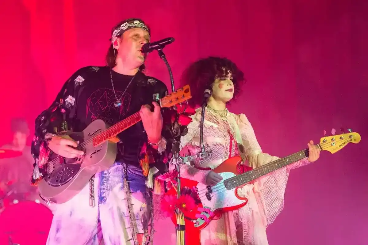Win Butler and Regine Chassagne of Arcade Fire perform during the Don't Think About The Pink Elephant Tour at Saenger Theatre on April 25, 2025 in New Orleans, Louisiana.