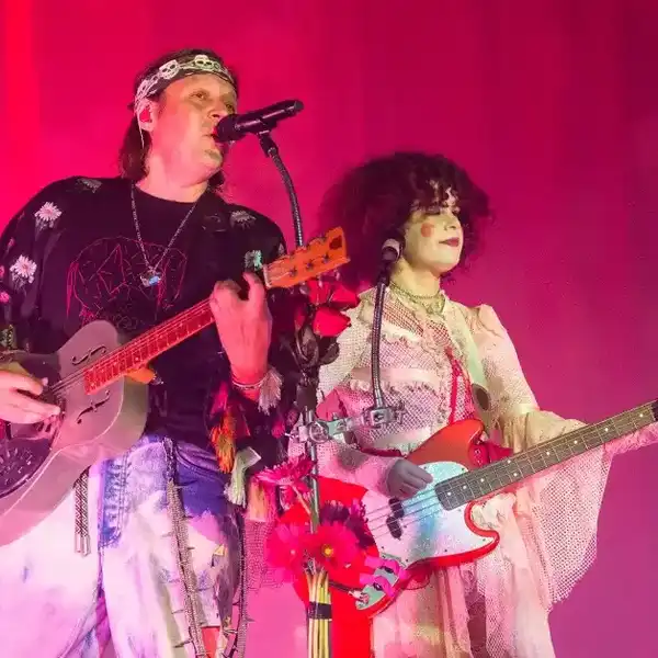 Win Butler and Regine Chassagne of Arcade Fire perform during the Don't Think About The Pink Elephant Tour at Saenger Theatre on April 25, 2025 in New Orleans, Louisiana.