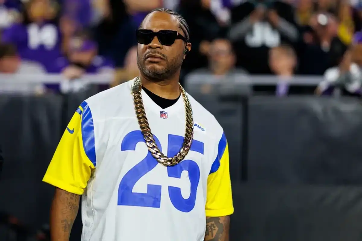 Xzibit stands on the sidelines prior to halftime of an NFC Wild Card game between the Minnesota Vikings and the Los Angeles Rams, at State Farm Stadium on January 13, 2025 in Glendale, Arizona.