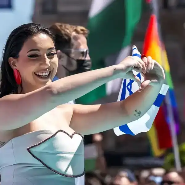 Yuval Raphael representing Israel with the song "New Day Will Rise" walks on the turquoise carpet next to the Basel Town Hall during the opening ceremony of the Eurovision Song Contest 2025 in Basel on May 11, 2025.